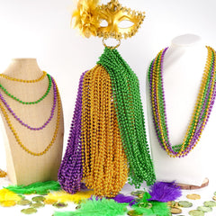 SHAOQINLIN close up of metallic purple green gold beads with glossy finish