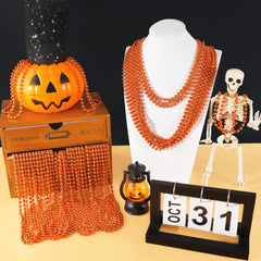 SHAOQINLIN Mardi Gras orange beads decor arranged for celebrations.