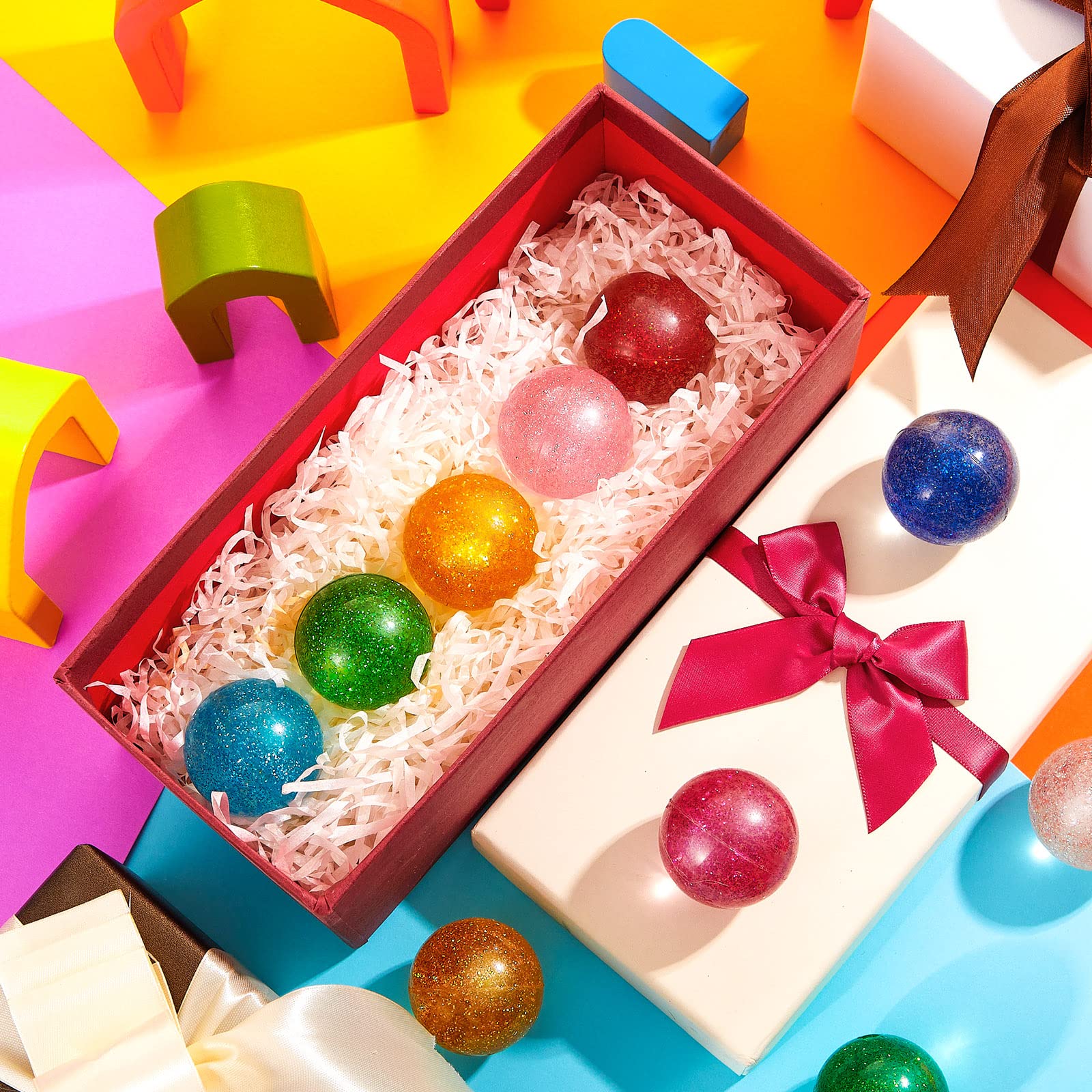 Shappy cat-friendly glitter balls attract kids and pets for play.