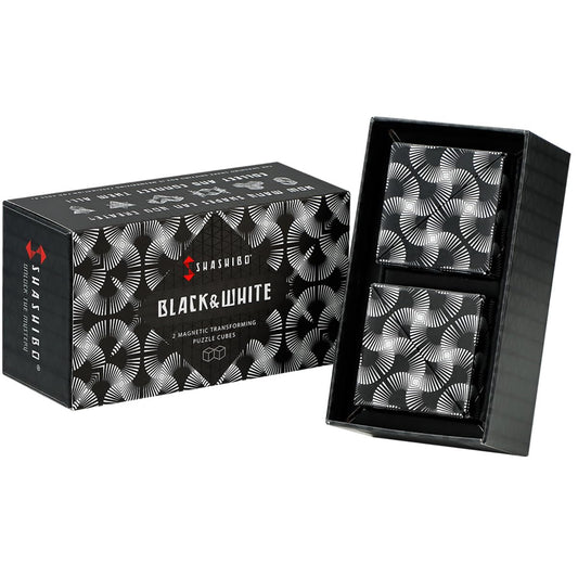 Shashibo black and white shape-shifting box in hand for focused fidgeting