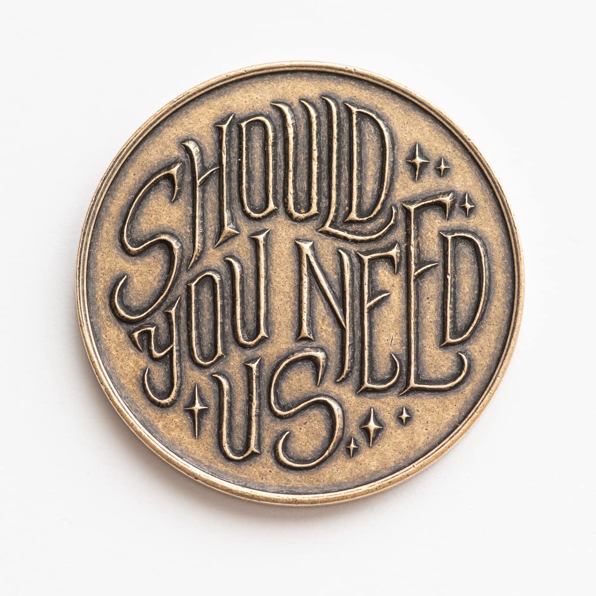 Shire Post Mint Labyrinth token with wax seal packaging highlights thoughtful presentation.