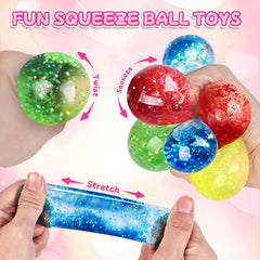 Durable, soft-touch squeeze balls with glitter accents included with valentines
