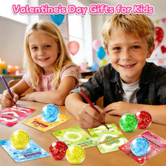 Kids writing names on cards to personalize ShyLizard valentines