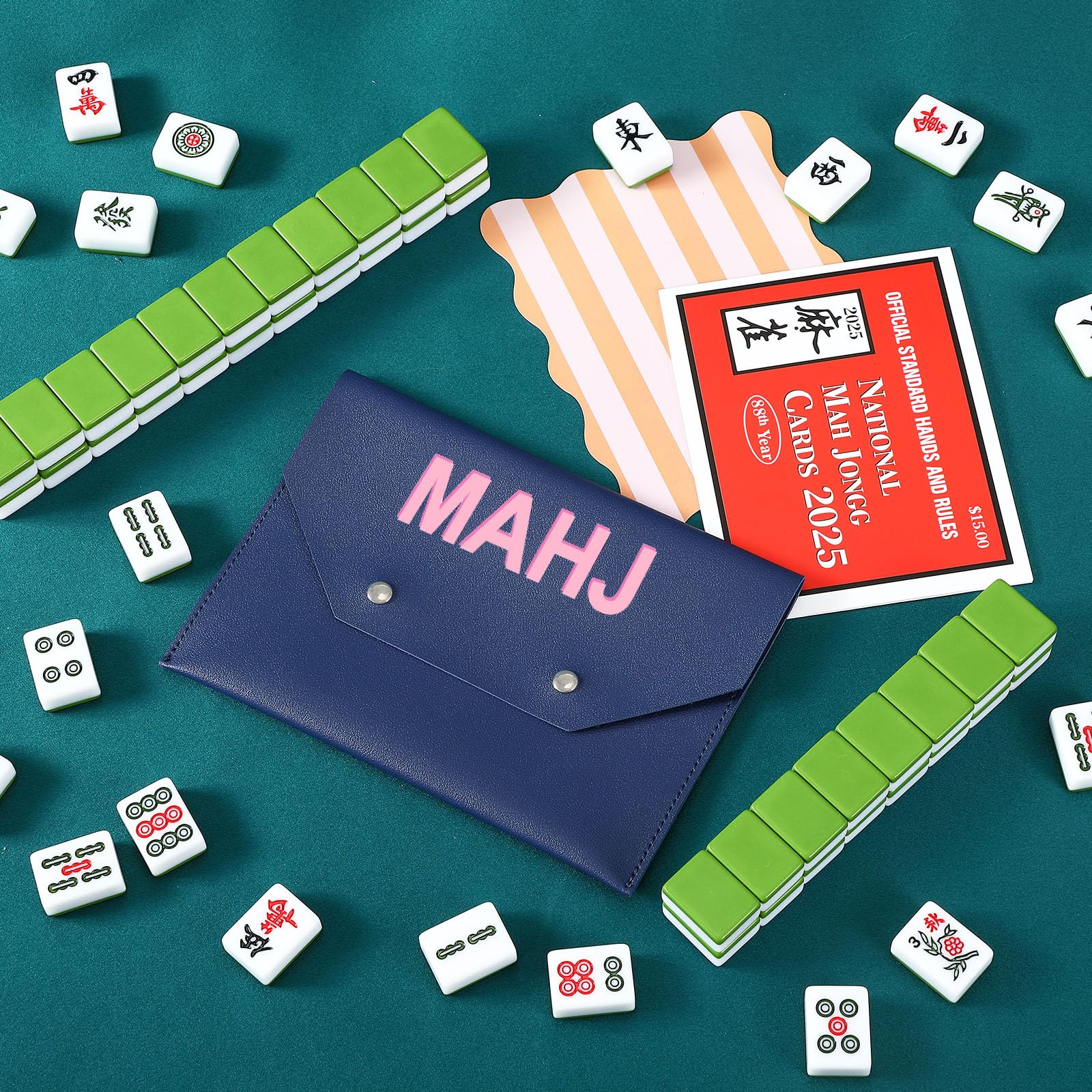 SilTriangle navy mahjong card holder tucked in a bag for easy travel.