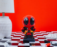 Silver Buffalo Deadpool Chibi Stance alongside other collectibles.