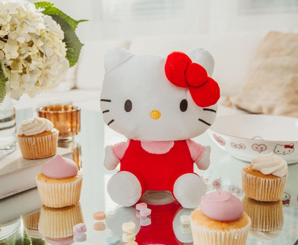 Silver Buffalo Hello Kitty plush coin bank ideal for gifts and keepsakes.