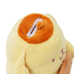 Silver Buffalo Pompompurin plush money bank cookie scene encourages saving.