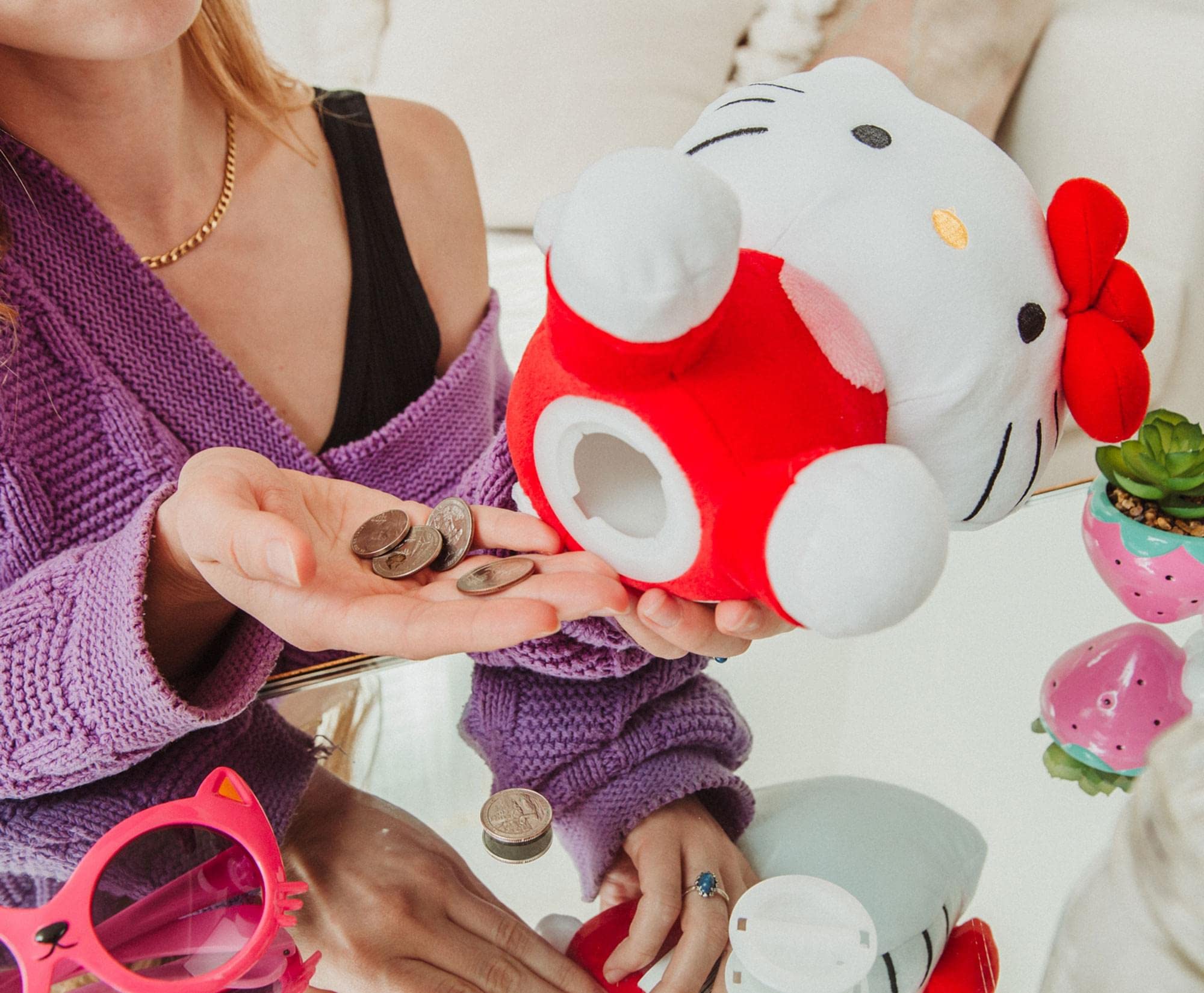 Silver Buffalo Sanrio Hello Kitty collectible plush bank brightens desks and shelves.