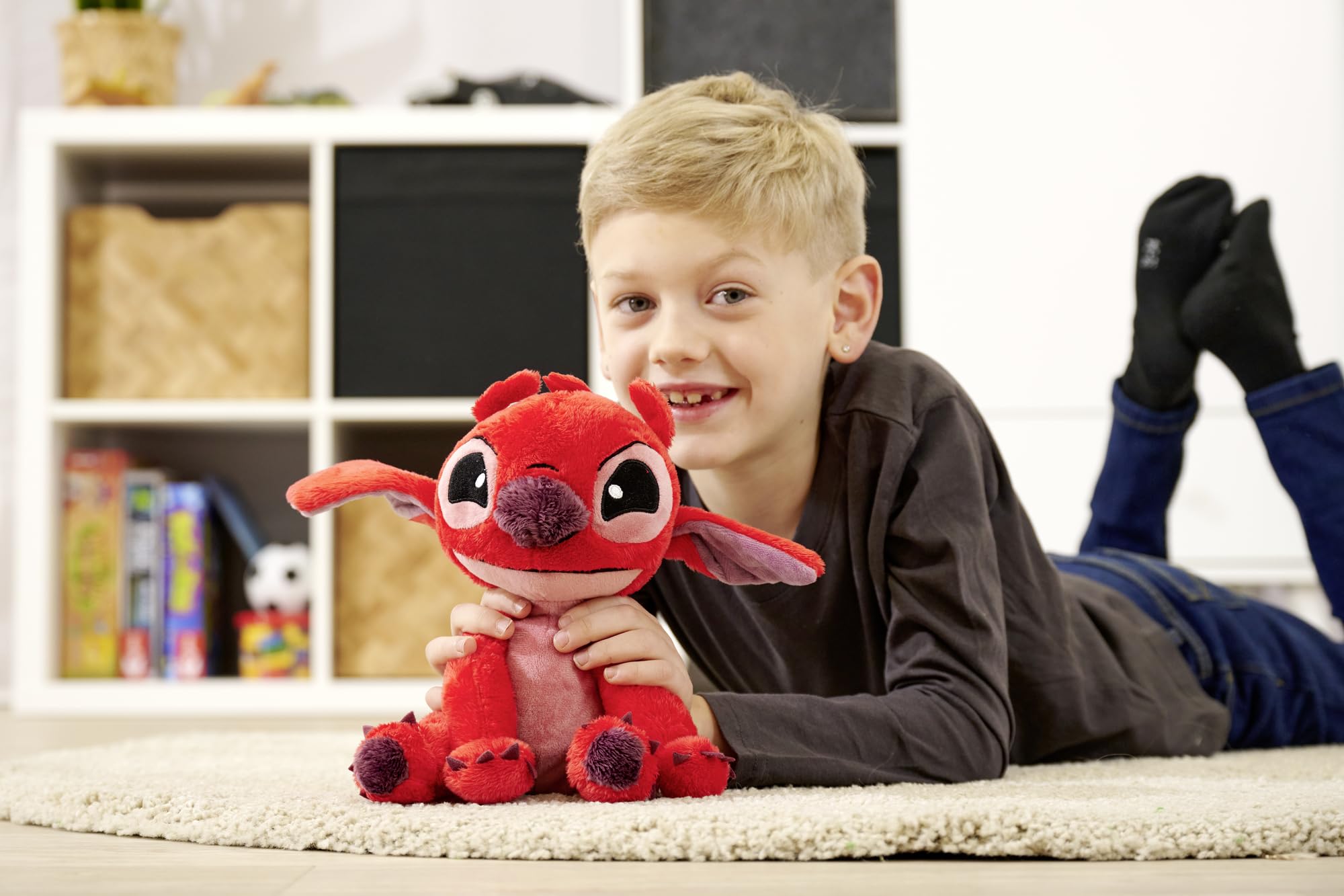 Leroy being hugged by a child demonstrates portable Disney friend