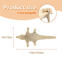 SIPWATE pangolin on a desk offering tactile stress relief during work.