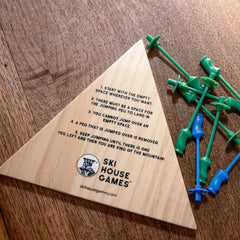 Ski House Games Peg Jump pieces ready for fast rounds with friends.