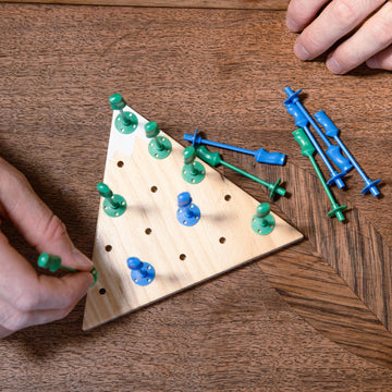 Ski House Games travel-compact case supports on-the-go apres-ski fun.