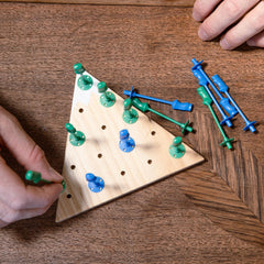 Ski House Games travel-compact case supports on-the-go apres-ski fun.