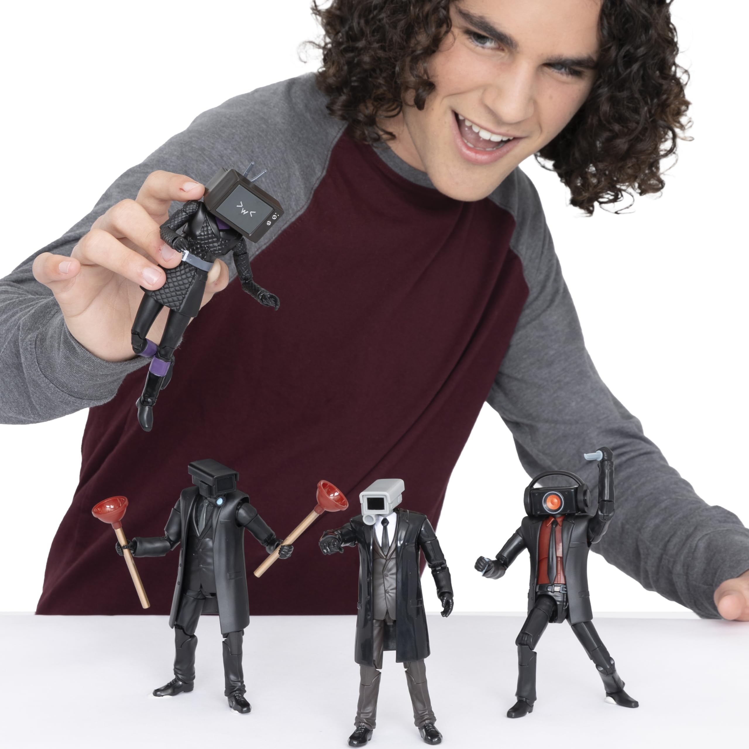 Cameraman figure in action poses for diorama setups.