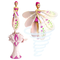 Sky Dancers Fuchsia Fantasy doll in flight over a living room, encouraging active play.