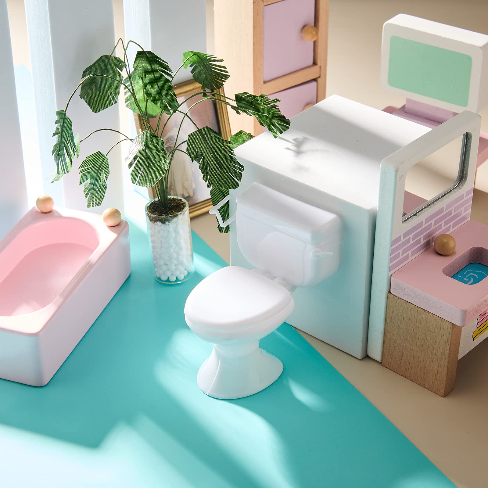 Skylety two-pack white mini toilets for cake toppers and decor.