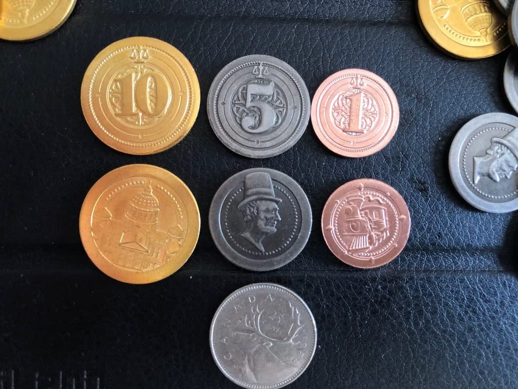 Sleeve Kings 50 metal coins closeup, ready to upgrade your board game experience with tactile weight.
