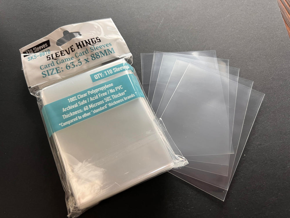 Sleeve Kings transparent sleeves keeping cards secure during play.