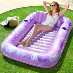 Sloosh inflatable tanning pool lounger with pillow for solo sunbathing.