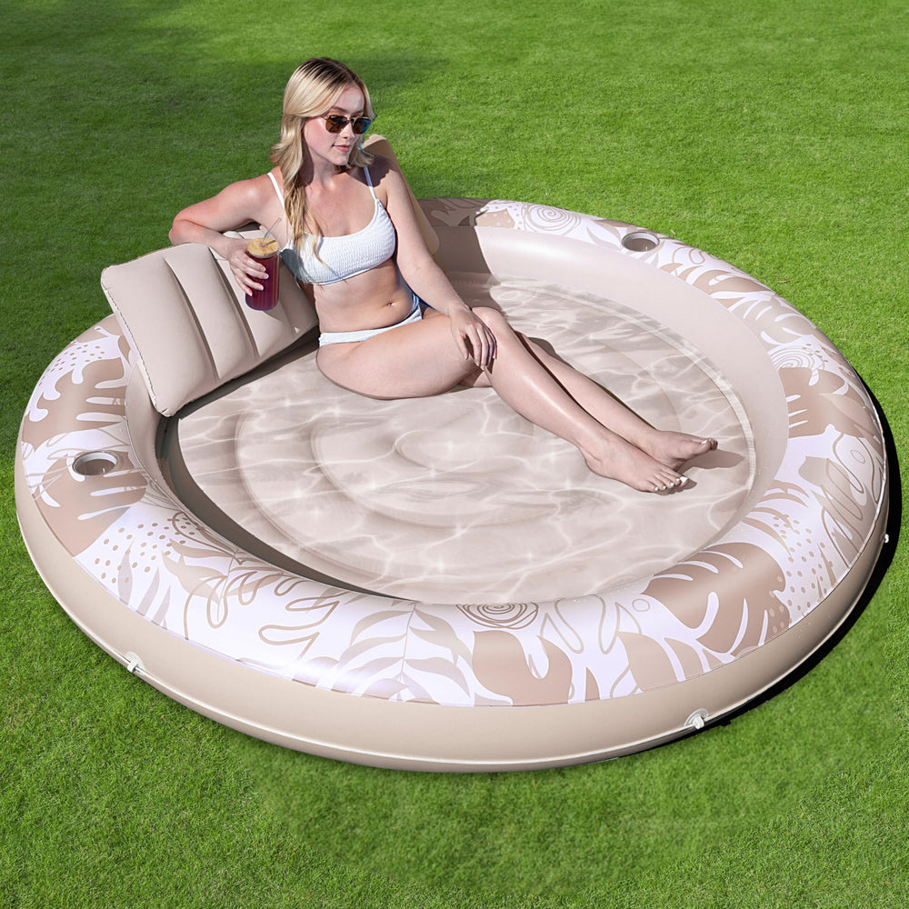 Sloosh 72-inch circular tanning pool float with pillow for relaxing sunbathing.