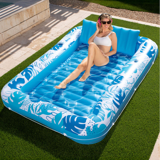 Sloosh inflatable tanning pool lounger offers a large 85 by 57 inch shared surface for two.