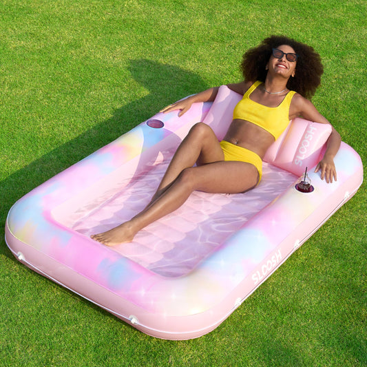 Sloosh inflatable tanning pool lounger in full view, ideal for private sunbathing by the pool.