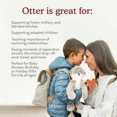 Child cuddling Otter Kin during bedtime routine
