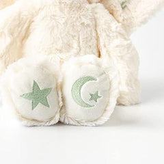 Slumberkins Sprite Kin on a bed creates a cozy bedtime scene.