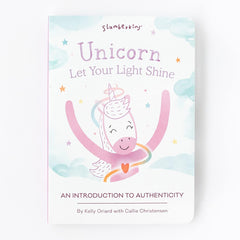 Slumberkins Unicorn Snuggler being held for a comforting bedtime hug.