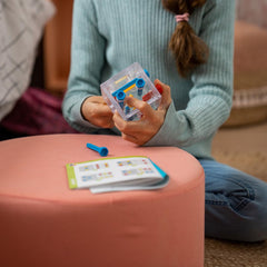 SmartGames Criss Cross Cube on a desk setup for focused practice.
