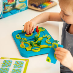 SmartGames Dinosaurs colorfully illustrated dino figures engage kids during learning adventures.