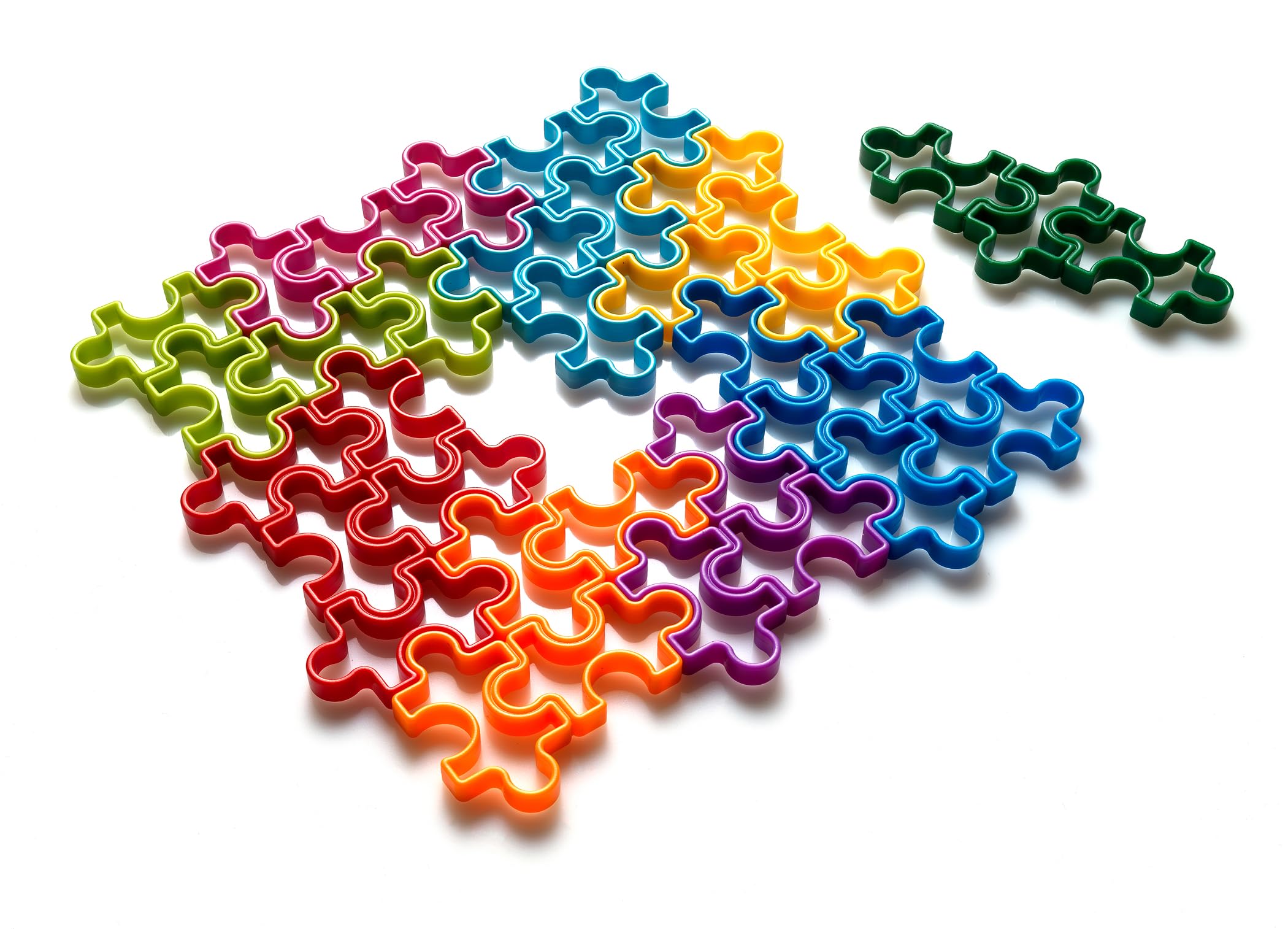 SmartGames IQ Jigsaw age range 7 to adult emphasizes versatile puzzle difficulty.