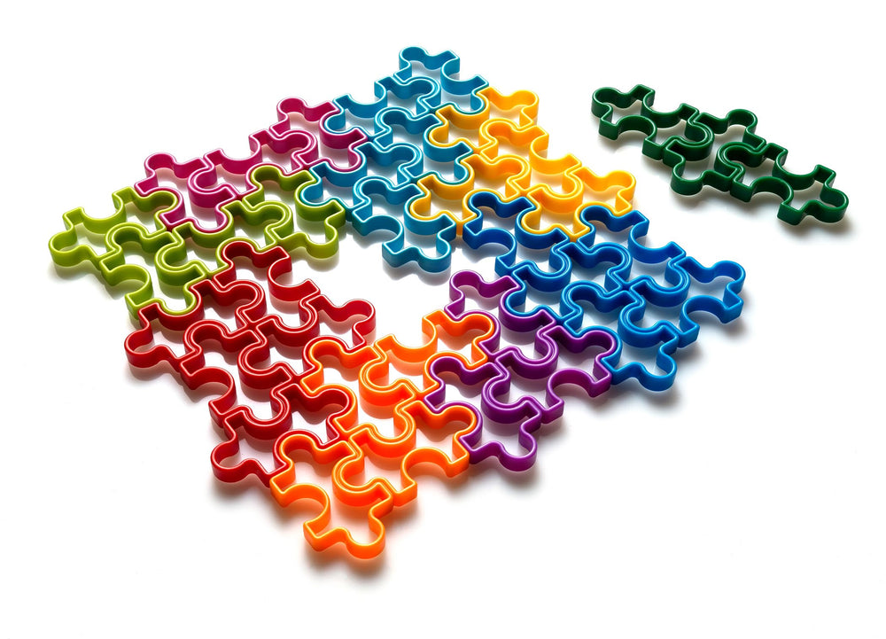 SmartGames IQ Jigsaw age range 7 to adult emphasizes versatile puzzle difficulty.