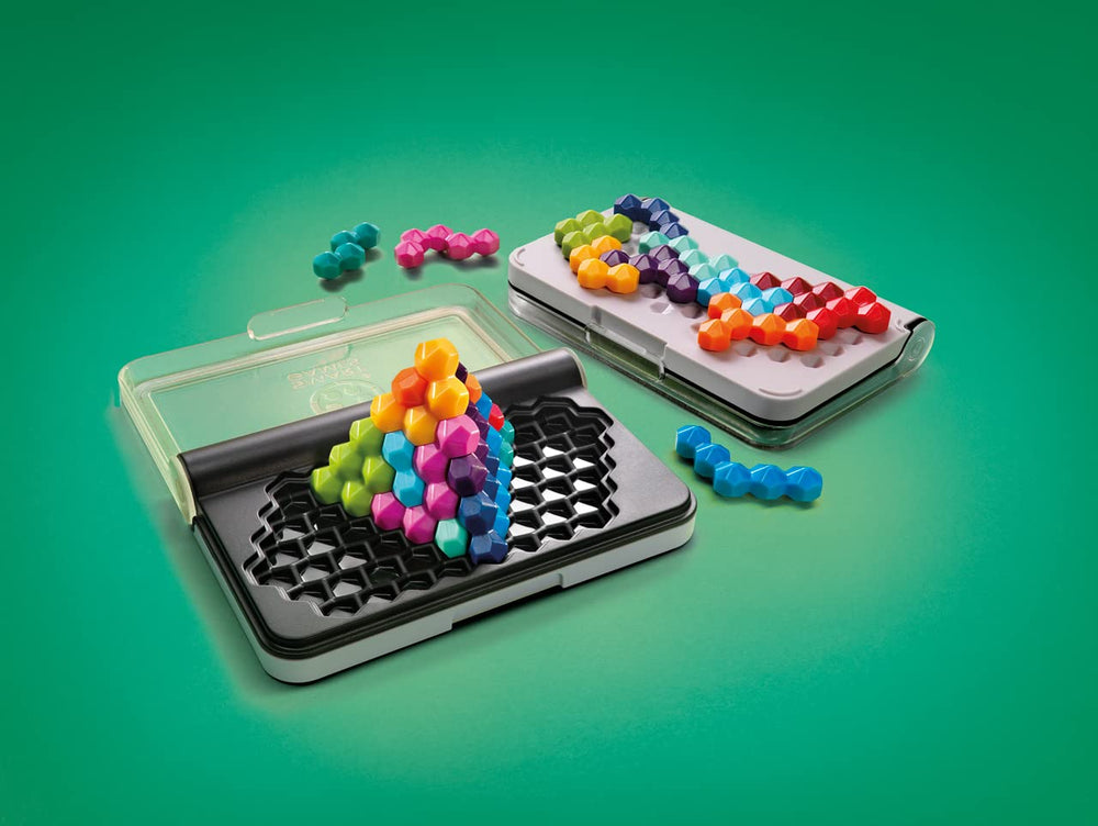 SmartGames IQ Six Pro challenge booklet with 120 puzzles and solutions.