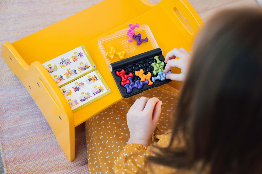 SmartGames IQ Waves compact design fits bags for screen-free fun anywhere