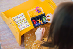 SmartGames IQ Waves compact design fits bags for screen-free fun anywhere