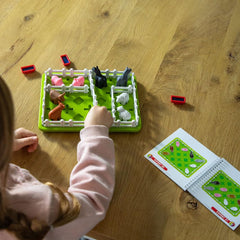 SmartGames Smart Farmer play area for solo sessions enhancing focus and critical thinking.
