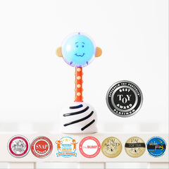 SmartNoggin NogginStik soft base rattle provides gentle auditory stimulation.