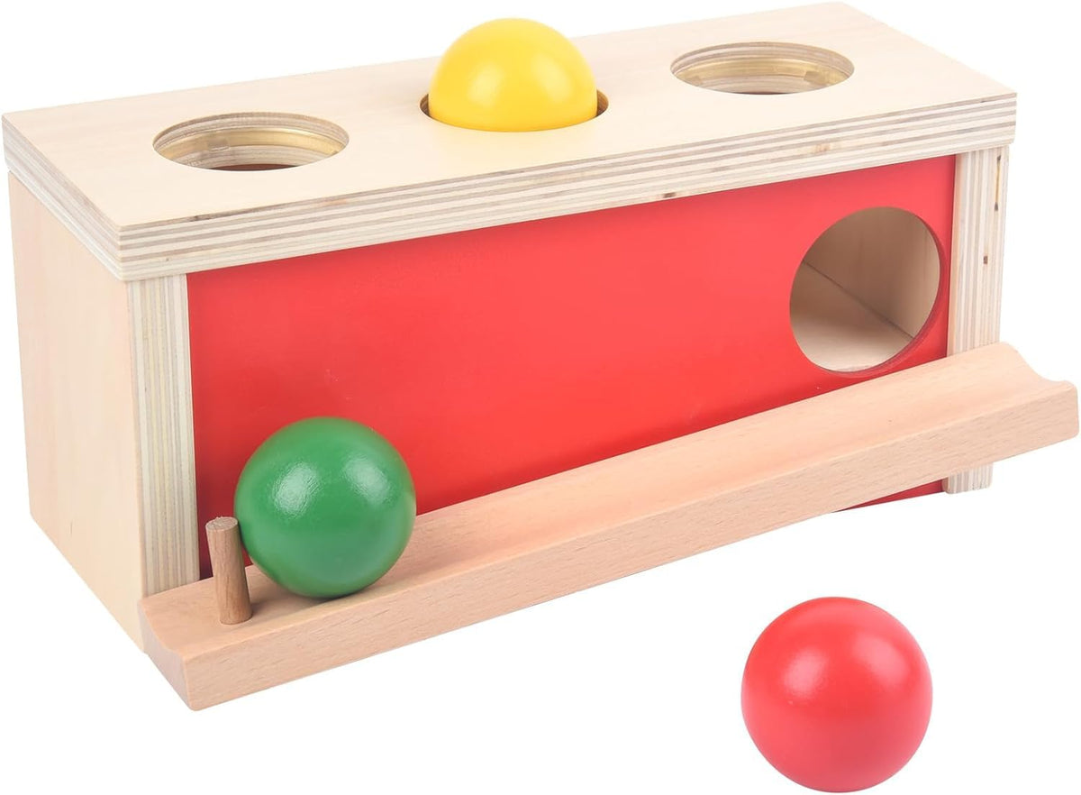 Smartwo Montessori box with ball drop showing early hand-eye coordination.
