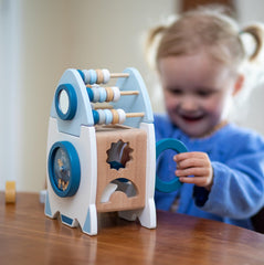 Smartwo rocket activity cube with shape sorting, abacus, and mirror exploration.