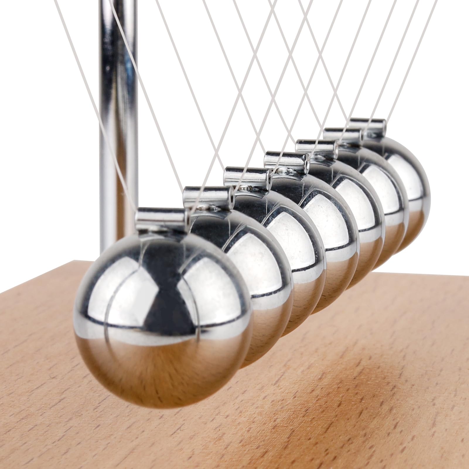 Beads from Smilesorg Newton's Cradle demonstrated in classroom setup