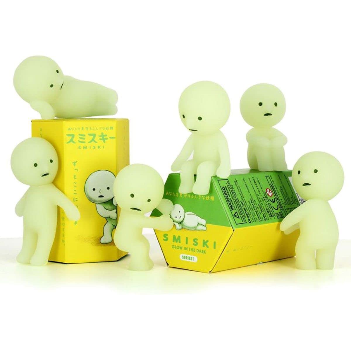 Smiski Series 1 sealed blind box figure glowing softly in the dark