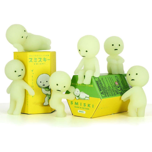 Smiski Series 1 sealed blind box figure glowing softly in the dark