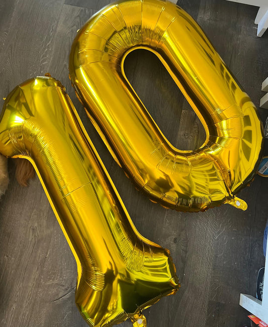 Smlpuame 40-inch number balloon 1 adds bold party flair and wall decoration.