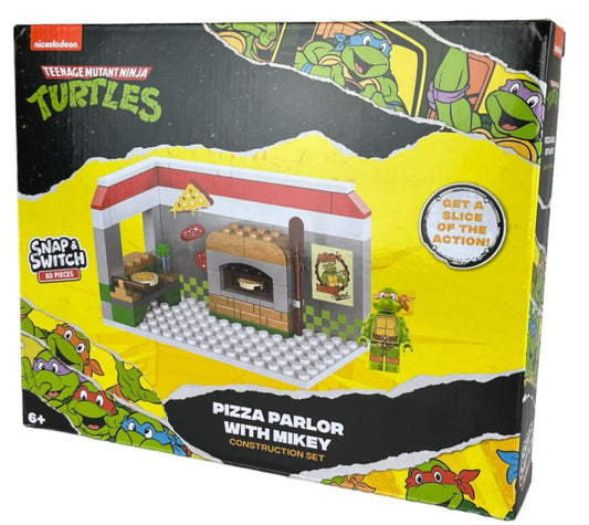 Snap & Switch Michelangelo figure included for action-packed TMNT play