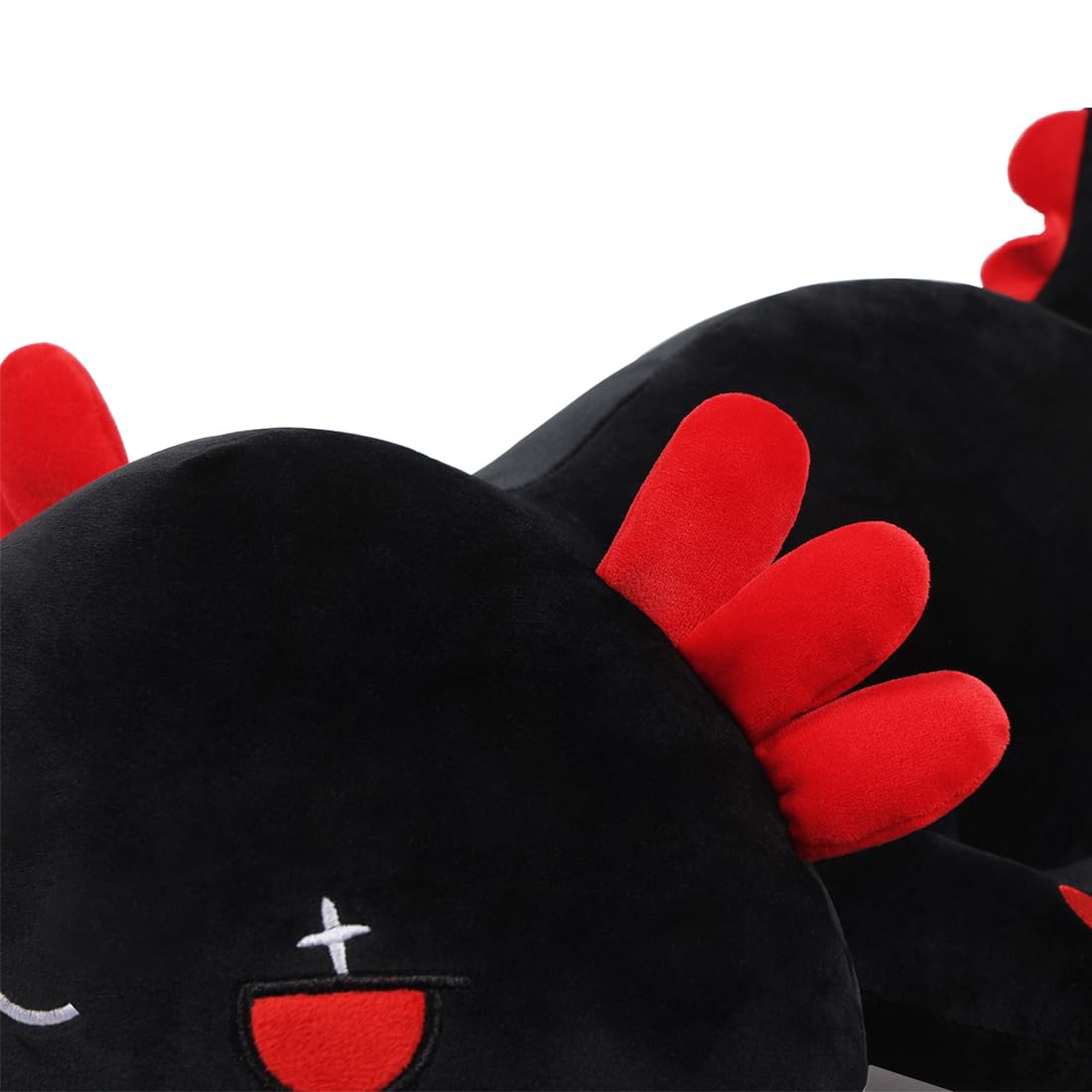 SNOWOLF black axolotl plush pillow on bed, decorative and comforting.