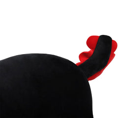 SNOWOLF black axolotl plush pillow on sofa, cozy living room decor.