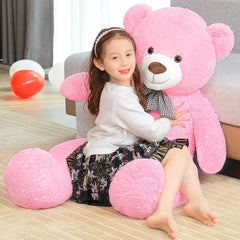 Snowolf Giant Pink Teddy Bear cuddle close-up highlights its plush softness.