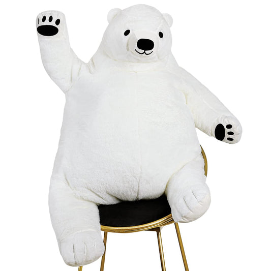 SNOWOLF Djungelskog Bear 60 cm on bed for cozy cuddle moments.