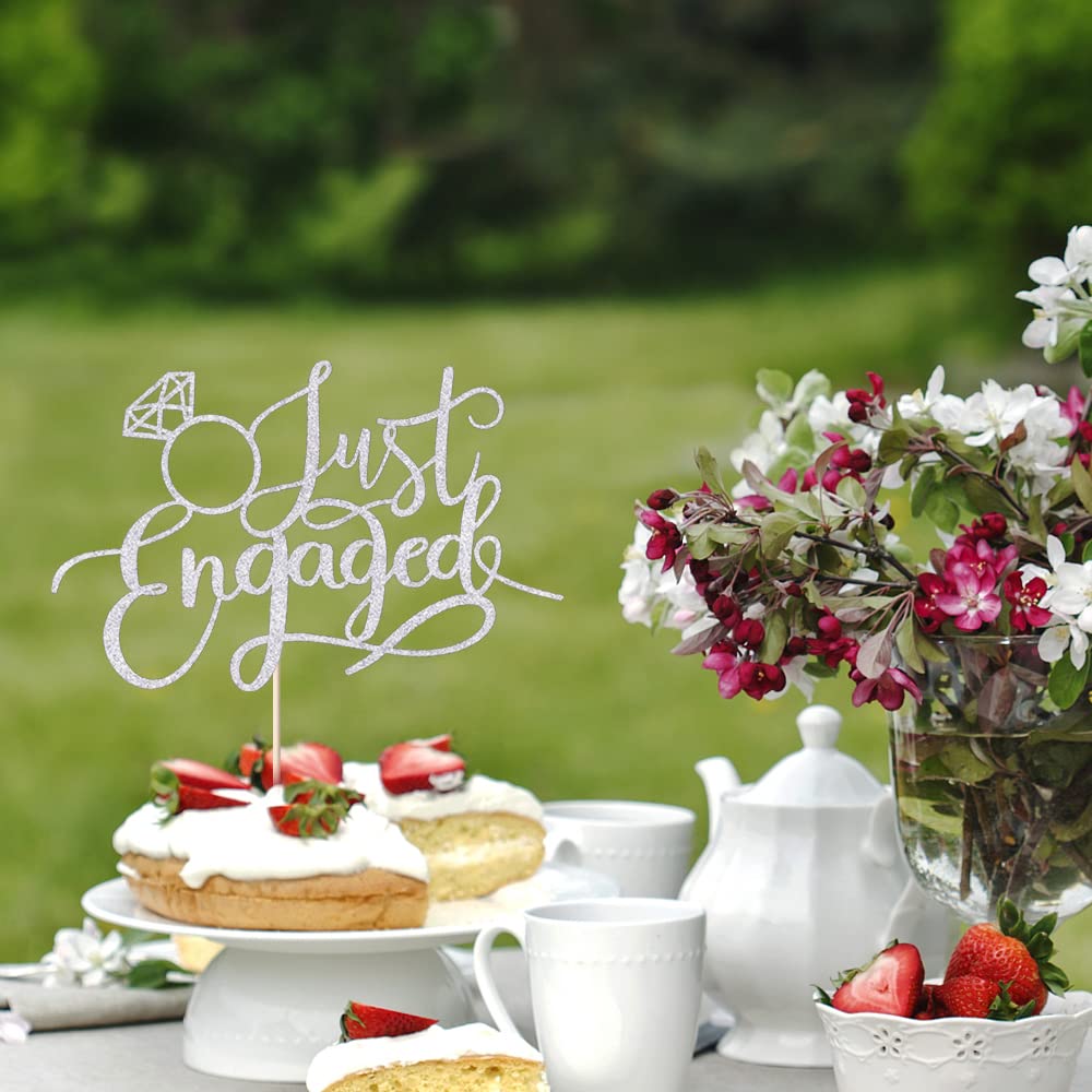 Sodasos elegant silver cake topper serves as a stylish keepsake.